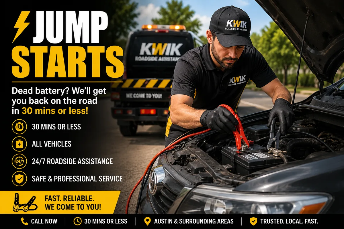 Kwik roadside technician jump-starting a car battery next to a Kwik service truck